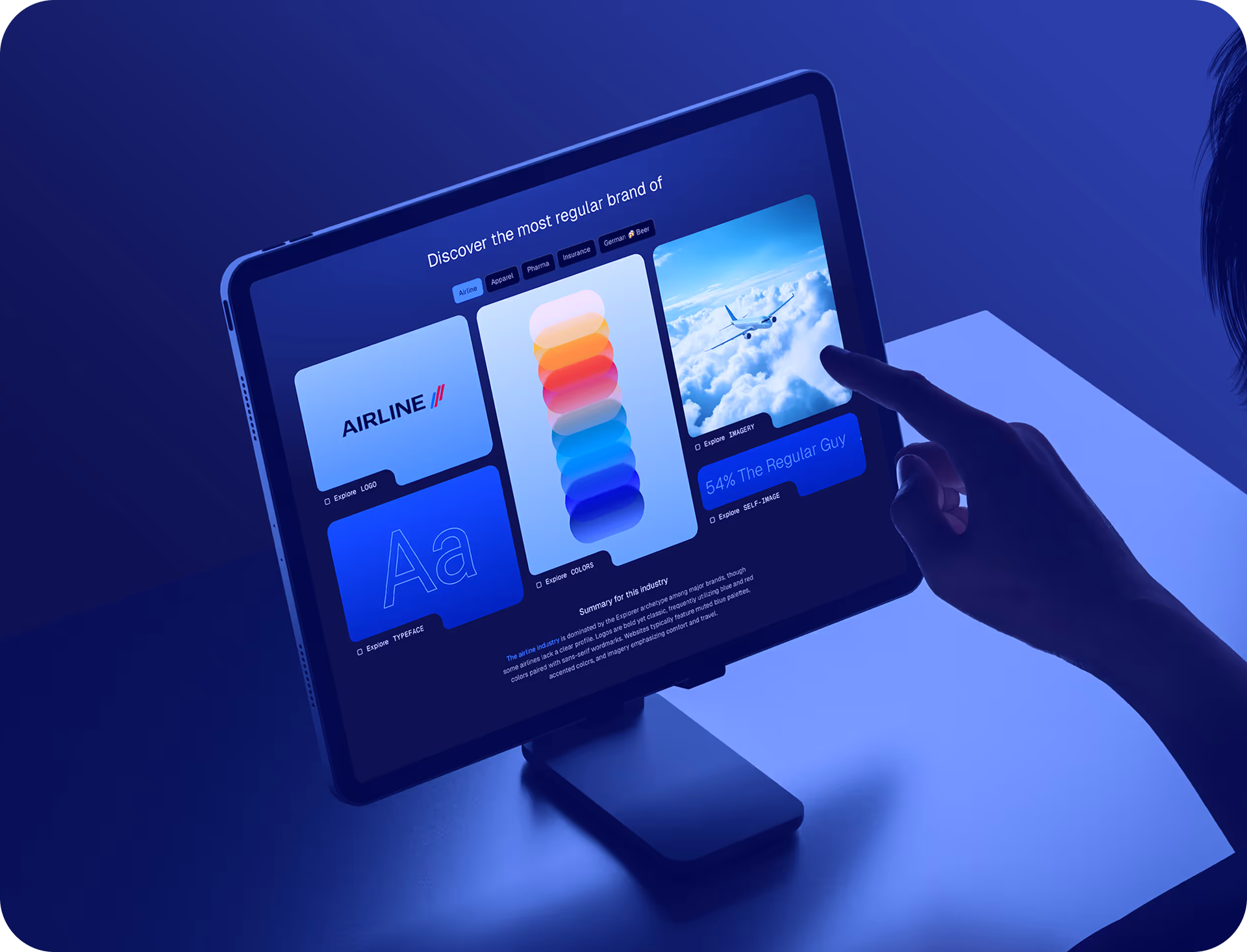 Tablet showing an The Regular Brand dashboard comparing logo, color, and imagery across an industry